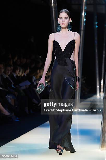 Model walks the runway during the Giorgio Armani Prive show as part of Paris Fashion Week Haute Couture Spring/Summer 2015 on January 27, 2015 in...