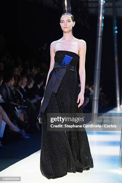 Model walks the runway during the Giorgio Armani Prive show as part of Paris Fashion Week Haute Couture Spring/Summer 2015 on January 27, 2015 in...