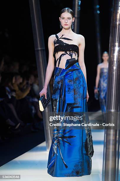 Model walks the runway during the Giorgio Armani Prive show as part of Paris Fashion Week Haute Couture Spring/Summer 2015 on January 27, 2015 in...