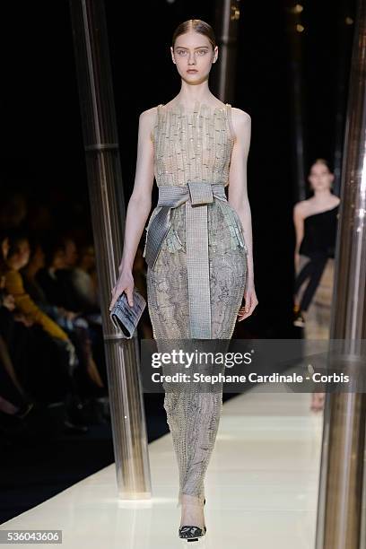 Model walks the runway during the Giorgio Armani Prive show as part of Paris Fashion Week Haute Couture Spring/Summer 2015 on January 27, 2015 in...