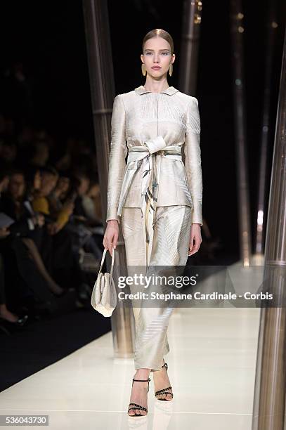 Model walks the runway during the Giorgio Armani Prive show as part of Paris Fashion Week Haute Couture Spring/Summer 2015 on January 27, 2015 in...