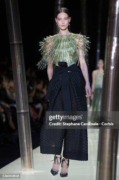 Model walks the runway during the Giorgio Armani Prive show as part of Paris Fashion Week Haute Couture Spring/Summer 2015 on January 27, 2015 in...