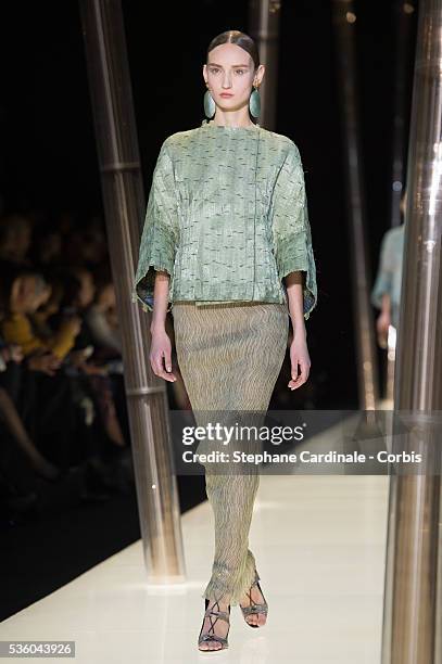 Model walks the runway during the Giorgio Armani Prive show as part of Paris Fashion Week Haute Couture Spring/Summer 2015 on January 27, 2015 in...