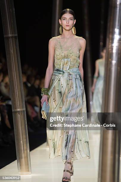 Model walks the runway during the Giorgio Armani Prive show as part of Paris Fashion Week Haute Couture Spring/Summer 2015 on January 27, 2015 in...