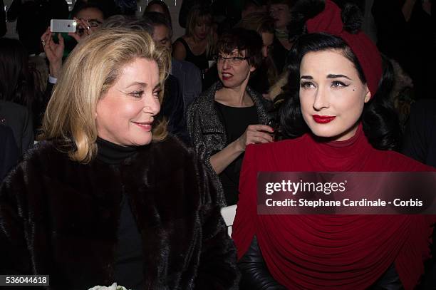 Catherine Deneuve and Dita Von Teese attend the Jean Paul Gaultier show as part of Paris Fashion Week Haute Couture Spring/Summer 2015 on January 28,...