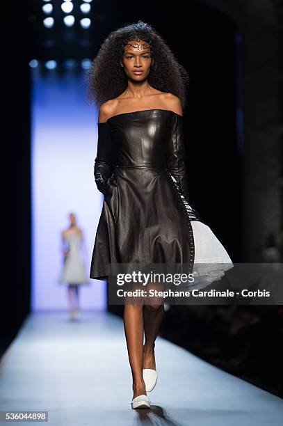 Model walks the runway at the end of the Jean Paul Gaultier show as part of Paris Fashion Week Haute Couture Spring/Summer 2015 on January 28, 2015...