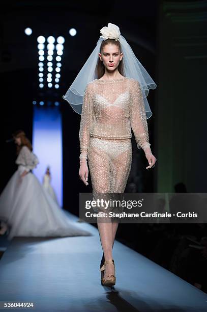 Model walks the runway at the end of the Jean Paul Gaultier show as part of Paris Fashion Week Haute Couture Spring/Summer 2015 on January 28, 2015...