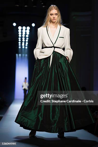 Model walks the runway at the end of the Jean Paul Gaultier show as part of Paris Fashion Week Haute Couture Spring/Summer 2015 on January 28, 2015...