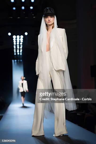 Model walks the runway at the end of the Jean Paul Gaultier show as part of Paris Fashion Week Haute Couture Spring/Summer 2015 on January 28, 2015...