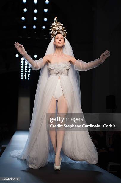 Anna Cleveland walks the runway at the end of the Jean Paul Gaultier show as part of Paris Fashion Week Haute Couture Spring/Summer 2015 on January...