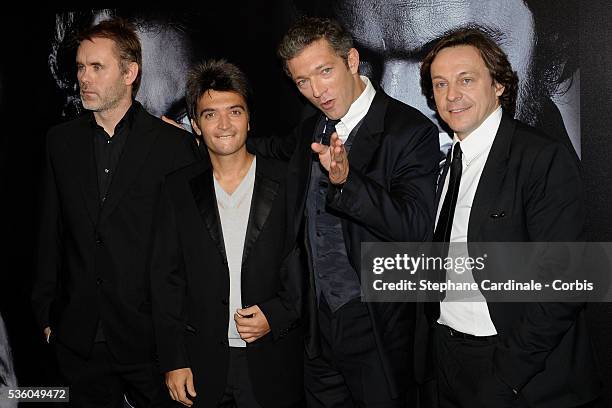 Jean francois Richet, Thomas Langmann, and Vincent Cassel arrive at the premiere of "Mesrine" in Paris.