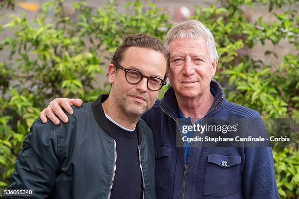 Actor Patrick Mille and Director Regis Wargnier attend day ten of the 2016 French Open at Roland Garros on May 31, 2016 in Paris, France.