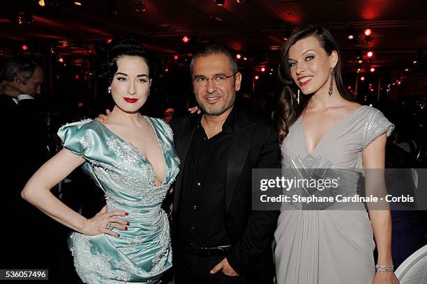 Mila Jovovich, Elie Saab and Dita Von Teese attend the 7th annual Sidaction fashion fundraising dinner to fight AIDS, in Paris.