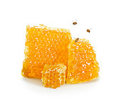 Pieces of Honeycomb with Bees Flying Around