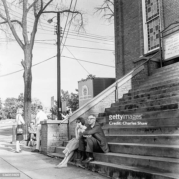 Pair of Civil Rights activists sit on the steps of the Dexter Avenue Baptist Church on the day before the Selma to Montogmery March arrived at the...