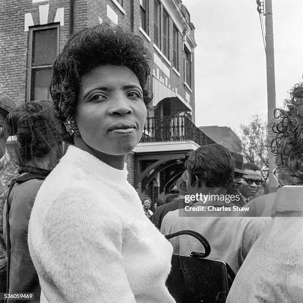 Close-up of a supporter on Dexter Avenue as she waits for the Selma to Montgomery March to arrive at the Alabama State Capitol, Montgomery, Alabama,...