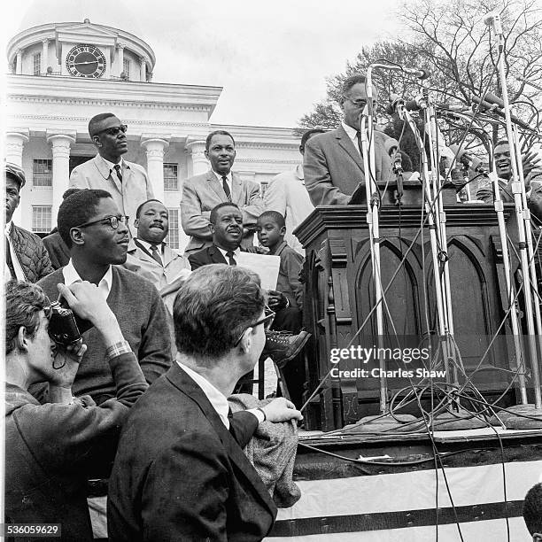 At the end of the Selma to Montgomery March, Civil Rights leader Ralph Bunche speaks to the assembled marchers and spectators in front of the Alabama...
