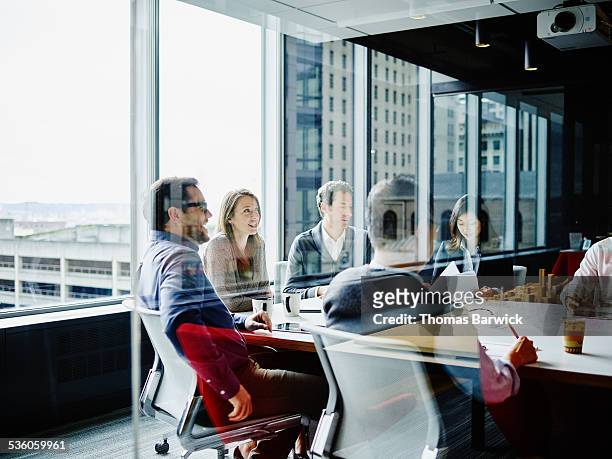 businesspeople meeting in office conference room - double exposure business stock pictures, royalty-free photos & images