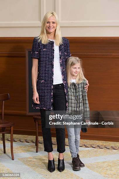 Carmen Kass attends the Chanel show at the 'Grand Palais', as part of the Paris Fashion Week Womenswear Fall/Winter 2015/2016 on March 10, 2015 in...