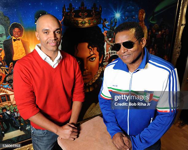 Jackie Jackson and painter/illustrator Kadir Nelson with the painting of Michael Jackson done by Nelson, December 8, 2010 in Los Angeles, California.