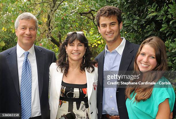 Chairman and CEO of JP Morgan Chase Jamie Dimon, his wife Judith Kent Dimon, their daughter and a friend attend the Lacoste and JP Morgan cocktail at...