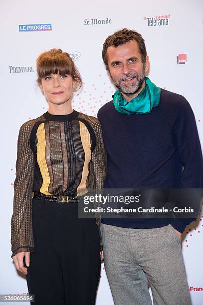 Eric Lartigau and Marina Fois attend The Lumiere! Le Cinema Invente exhibition preview, at 'Le Grand Palais' on March 26, 2015 in Paris, France.