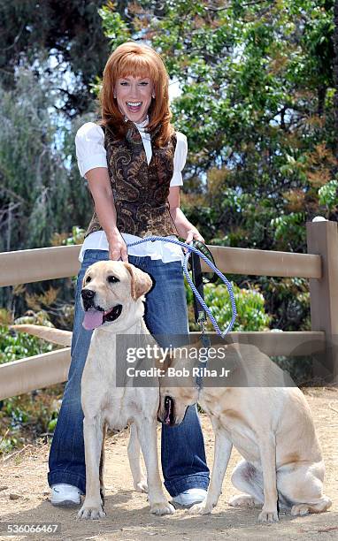 Comedian Kathy Griffin, whose Emmy winning Bravo show returns for another season photographed with her two Labs 'Larry' and 'Pom Pom' , May 28, 2010...