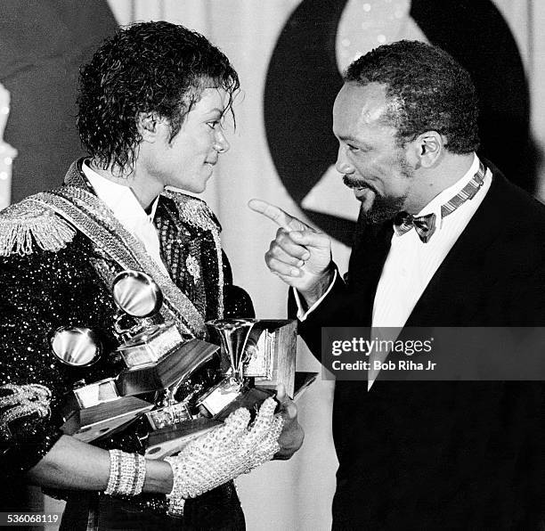 Michael Jackson and Quincy Jones with Grammy Awards Jackson won at the 26th Annual Grammy Awards, February 28, 1984 at the Shrine Auditorium in Los...