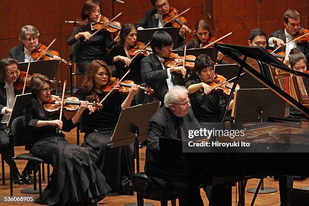 Emanuel Ax performing Chopin's "Piano Concerto in F minor" with the New York Philharmonic led by David Robertson at Avery Fisher Hall on Wednesday...