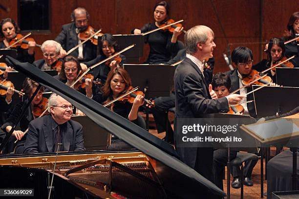 Emanuel Ax performing Chopin's "Piano Concerto in F minor" with the New York Philharmonic led by David Robertson at Avery Fisher Hall on Wednesday...