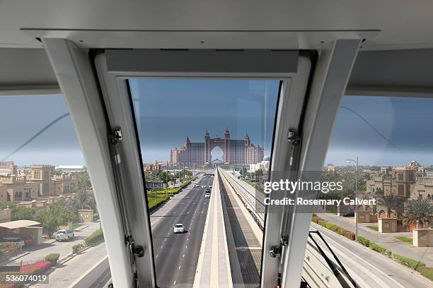 Atlantis Hotel at top of The Palm viewed from monorail train, The Palm, Dubai, United Arab Emirates.