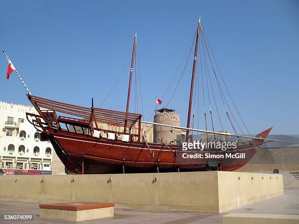 Dhow, a traditional sailing vessel, outside the Dubai Museum, Al Fahidi Fort, Bur Dubai, Dubai, United Arab Emirates.