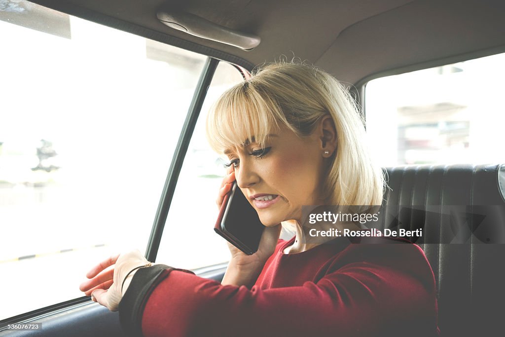 Business Woman In A Taxi, Weird Face