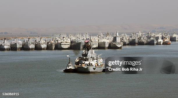 The USS Iowa - the world's last Battleship from WWII era is towed by tugboats from the Navy mothball fleet in Benicia, CA on it's 1st leg of its...