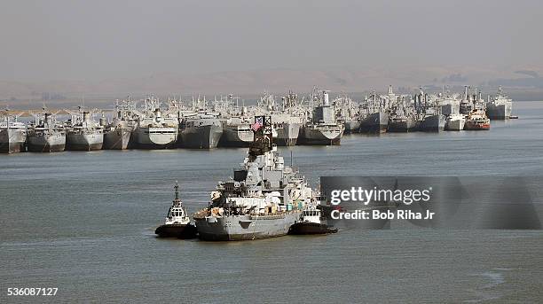 The USS Iowa - the world's last Battleship from WWII era is towed by tugboats from the Navy mothball fleet in Benicia, CA on it's 1st leg of its...