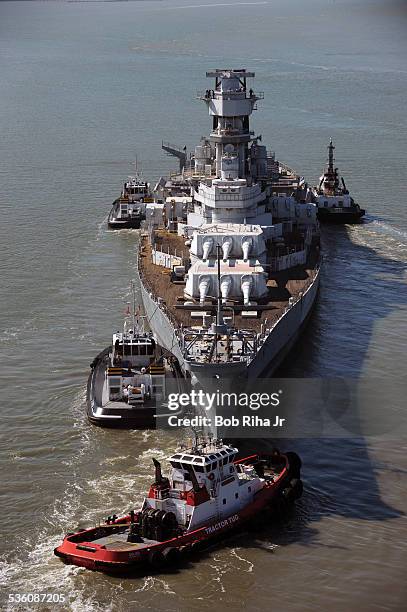 The USS Iowa - the world's last Battleship from WWII era is towed by tugboats from the Navy mothball fleet in Benicia, CA on it's 1st leg of its...