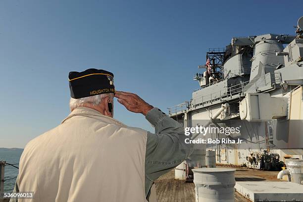 Retired US Navy veteran Richard Landgraff onboard the USS Iowa - the world's last Battleship from WWII era as it's towed by tugboats from the Navy...