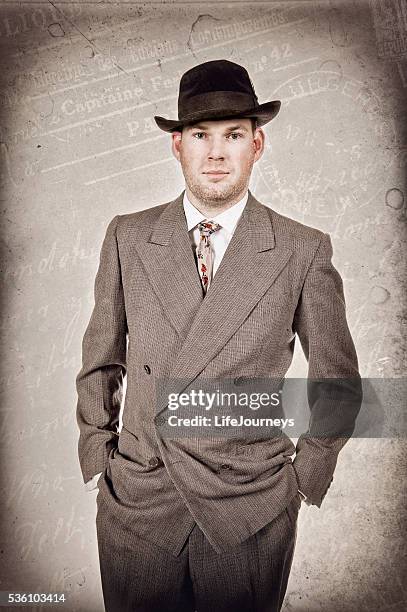 1940's business man in suit hat and tie - hat and suit stock pictures, royalty-free photos & images