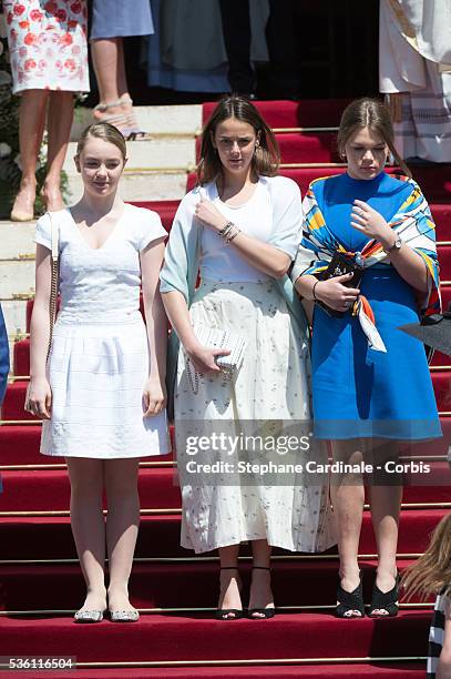 Alexandra of Hanover, Pauline Ducruet and Camille Gottlieb attend the baptism of the Princely Children at the Monaco cathedral on May 10, 2015 in...