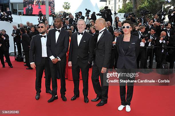 Abd al Malik and guest attend the opening ceremony and premiere of "La Tete Haute" during the 68th Annual Cannes Film Festival