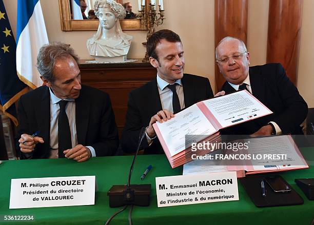 French Economy Minister Emmanuel Macron , French steel group Vallourec chief executive Philippe Crouzet and French aircraft engine maker Safran Group...