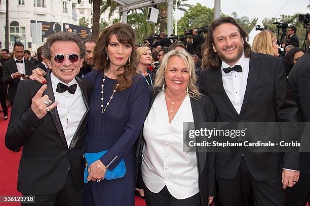 Philippe Manoeuvre and wife Candice de la Richardiere with Valerie Damidot and Regis Viogeat attends the "Mad Max : Fury Road" Premiere during the...