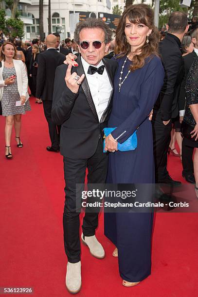 Philippe Manoeuvre and wife Candice de la Richardiere attends the "Mad Max : Fury Road" Premiere during the 68th Cannes Film Festival