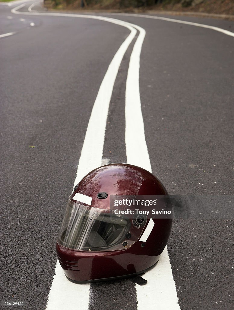 Motorcycle Helmet on White Dividing Line