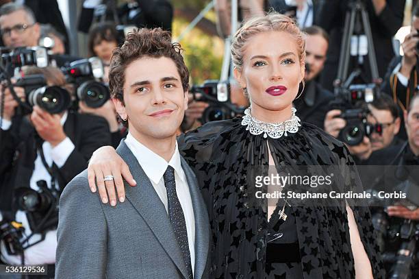 Xavier Dolan and Sienna Miller attends at the "Carol" Premiere during the 68th Cannes Film Festival