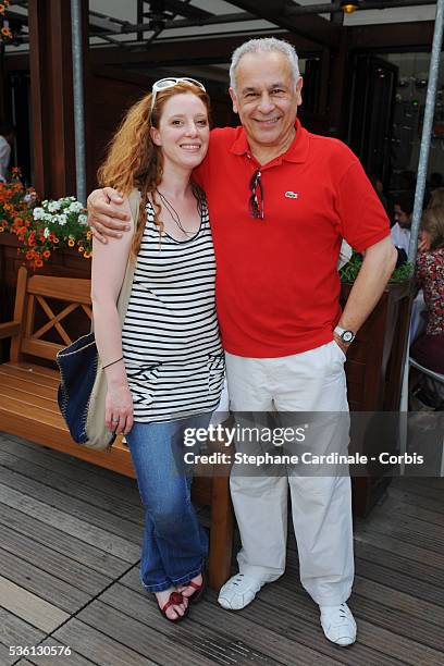 Francis Perrin with his wife Gersende at Roland Garros Village.