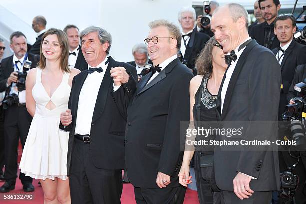 Pierre Menez, Dominique Besnehard and guest attend the 'Inside Out' Premiere during the 68th annual Cannes Film Festival