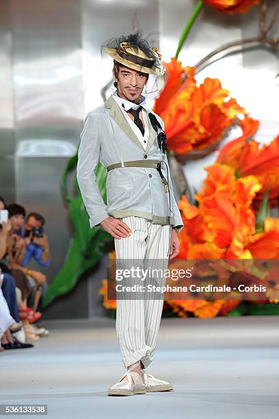 Designer John Galliano walks the runway at the end of the Christian Dior show, as part of the Paris Haute Couture Fashion Week Fall/Winter 2010-2011,...