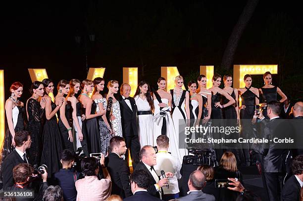 Fawaz Gruosi and models attend at the De Grisogono "Divine In Cannes" Dinner Party at Hotel du Cap-Eden-Roc during the 68th Cannes Film Festival