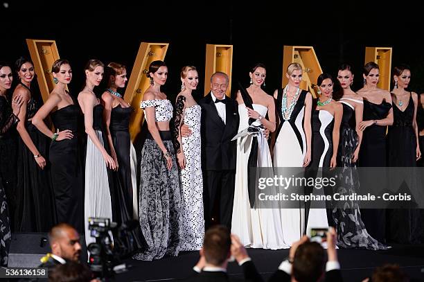 Fawaz Gruosi and models attend at the De Grisogono "Divine In Cannes" Dinner Party at Hotel du Cap-Eden-Roc during the 68th Cannes Film Festival